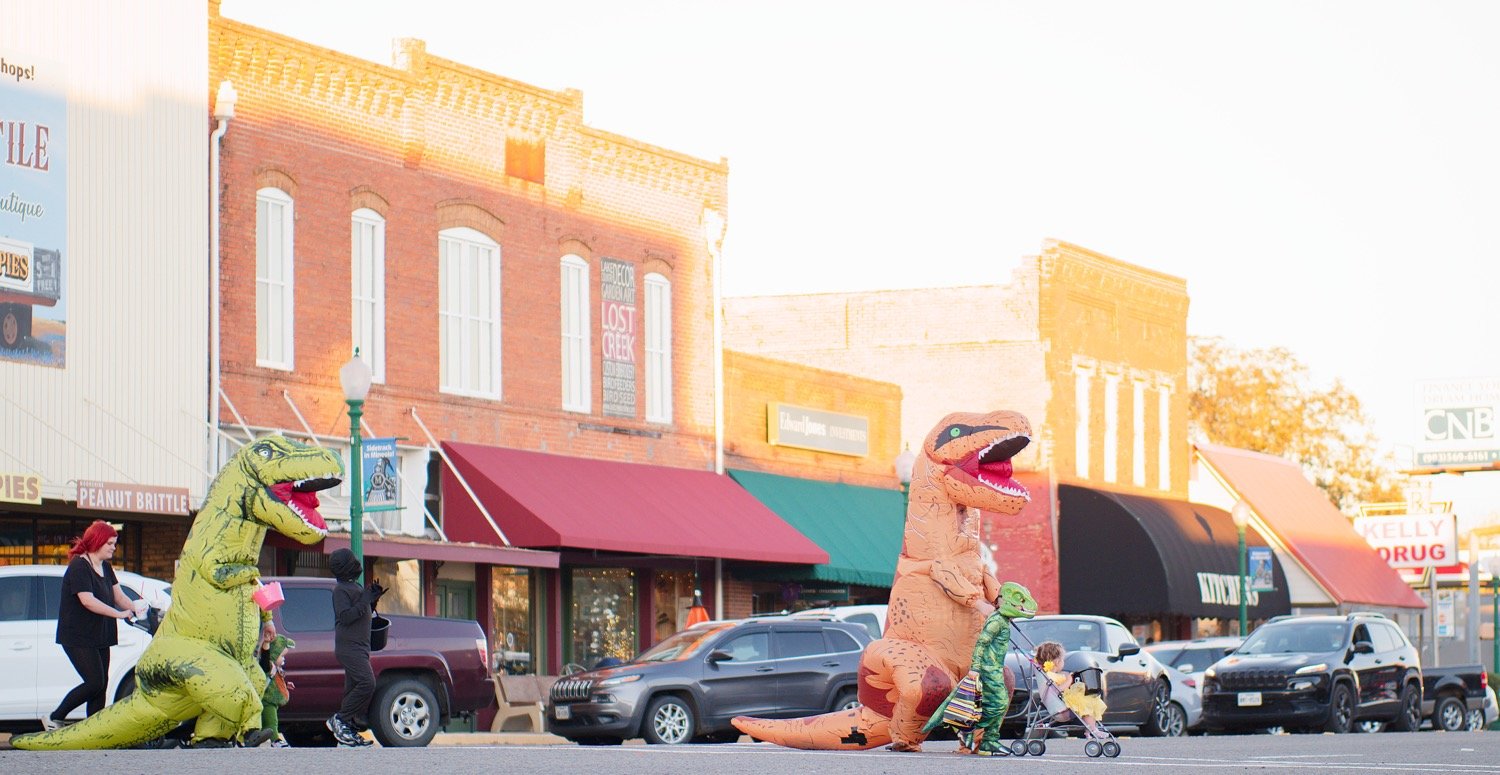 Dinosaurs take over downtown Mineola. [See more spooks, if you dare.]